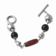 Sterling silver bracelet with black onyx & natural madrepore.