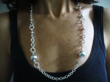 Long silver necklace with beads