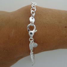 Silver bracelet with sailboat charm