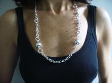Long silver necklace with beads